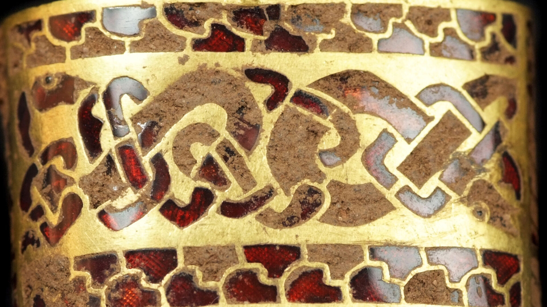 Puzzlopedia | Puzzle Gold sword hilt fitting with cloisonné garnet